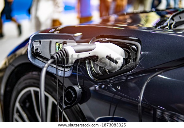 E-power car concept, car electric power
charging, EV car concept, technology power of the car, close up EV
charging.
