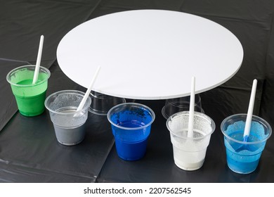 epoxy resin set with blue shades in glasses and canvas for a picture - Shutterstock ID 2207562545