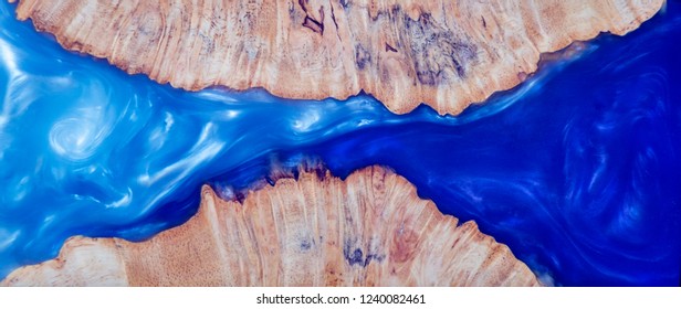 
Epoxy resin Stabilizing Afzelia burl exotic wood blue sky  background texture, Abstract art picture photo, print design and your advertisement