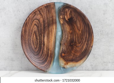 epoxy resin wood dish blue sea, abstract art background texture. Concept of home decoration on gray background