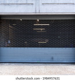 Epsom Surrey London UK, June 03 2021, A Closed Secured Security Shutter At The Entrance Of A Private Car Park With No People