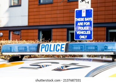 Epsom Surrey London UK, March 21 2022, Police Car In Offical Parking Bay With Public Notice