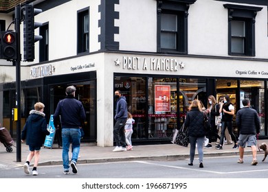 Epsom Surrey London UK, May 02 2021, Group Of People Crossing The Main Road Next To A High Street Pret A Manger Coffee Shop