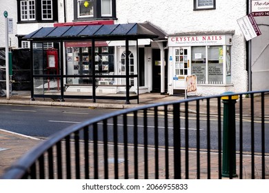 Epsom Surrey London UK, October 31 2021, Womans Nail Bar On A High Street With An Empty Bus Shelter And No People