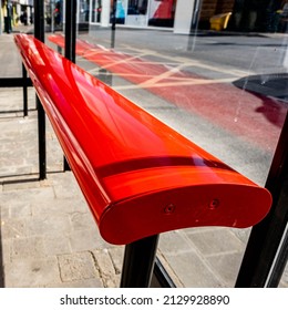 Epsom Surrey UK, February 27 2022, Bright Red Searting In A Public Transport Bus Shelter With No People