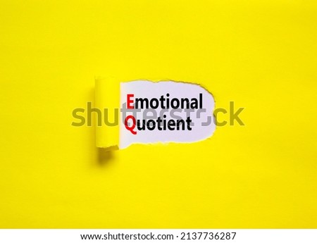 EQ emotional quotient symbol. Concept words EQ emotional quotient on yellow paper on a beautiful yellow table white background. Business EQ emotional quotient concept, copy space.