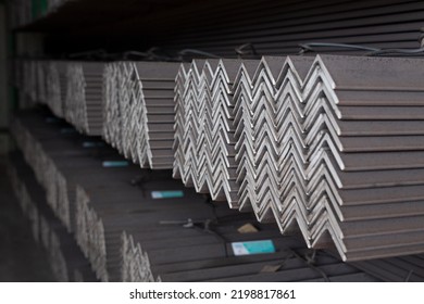 Equal Angles Steel angle iron Metal profile angle in packs at the warehouse of metal products
The arrangement of hot-dip green steel angles on the rack in warehouseMetal profile angle in packs  - Shutterstock ID 2198817861