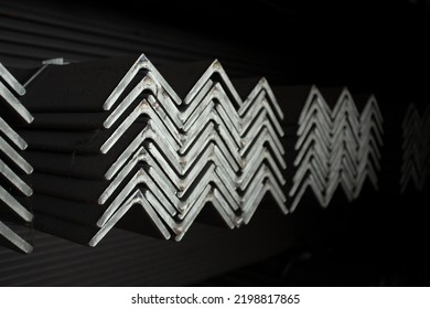 Equal Angles Steel angle iron Metal profile angle in packs at the warehouse of metal products
The arrangement of hot-dip green steel angles on the rack in warehouseMetal profile angle in packs  - Shutterstock ID 2198817865