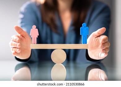 Equal Gender Seesaw Balance. Job Sex Parity