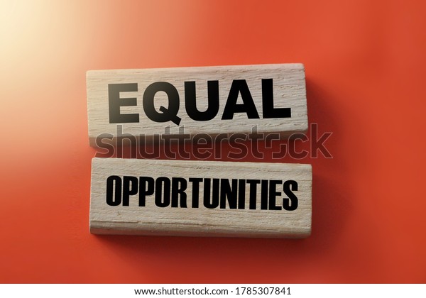 Equal Opportunities words on wooden blocks.\
Equality concept.