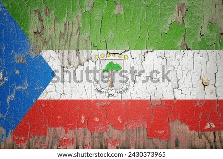 Equatorial Guinea flag and paint cracks. Prison concept with border image. Equatorial Guinea is currently heading toward recession. Inflation. employment. economic recession. Double exposure hologram
