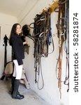 equestrian in a stable