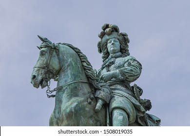 Equestrian statue of Louis XIV (1836) on Place d'Armes in front of Palace of Versailles. Palace Versailles was a royal chateau. Versailles, Paris, France. {Inscription: King of France and Navarre}