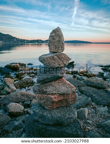 Equilibrium of the pile of stones in the nature