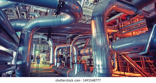 Equipment, cables and piping as found inside of a modern industrial power plant                        - Powered by Shutterstock