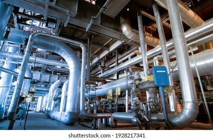 Equipment, Cables And Piping As Found Inside Of A Industrial Power Plant