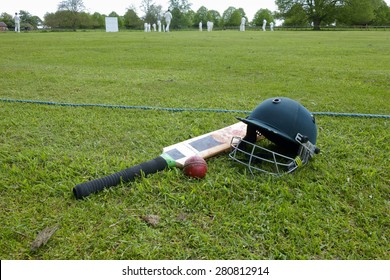 Equipment At Cricket Match On English Village Green.