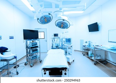equipment and medical devices in modern operating room take with blue filter