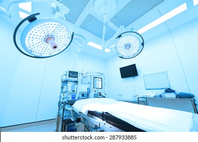 equipment and medical devices in modern operating room take with blue filter