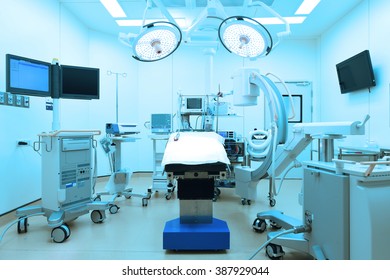 equipment and medical devices in modern operating room take with art lighting and blue filter  - Shutterstock ID 387929044