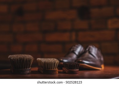 Equipment For Shoe Shining Against The Brick Wall