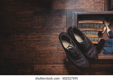 Equipment For Shoe Shining On Wooden Table