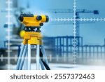 Equipment for surveyor. Yellow optical theodolite. Laser geodetic device. Equipment for create topographic maps. Optical theodolite near building under construction. Tech for geodetic research