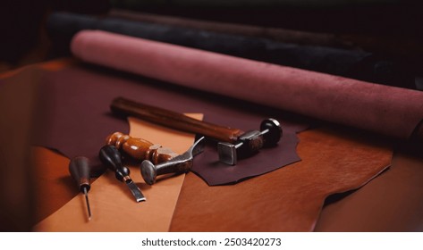 Equipment of Tailor for making shoe on background different rolls natural brown leather. Banner shoemaker industry, craftsman of workshop for skin. - Powered by Shutterstock