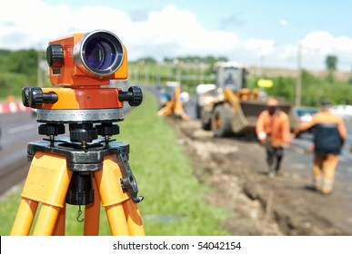 equipment theodolite tool at construction site works in summer