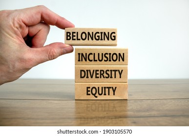 Equity, diversity, inclusion and belonging symbol. Wooden blocks with words 'equity, diversity, inclusion, belonging' on beautiful white background. Diversity, equity, inclusion and belonging concept. - Shutterstock ID 1903105570
