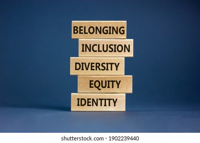 Equity, idenyity, diversity, inclusion, belonging symbol. Wooden blocks with words identity, equity, diversity, inclusion, belonging on beautiful grey background. Inclusion, belonging concept.