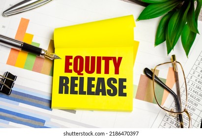 Equity Release text on the paper with pen - Shutterstock ID 2186470397