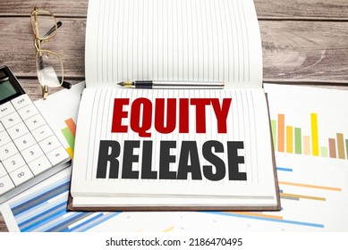 Equity Release words on brown diary and glasses, calculator and pen on wooden desk - Shutterstock ID 2186470495