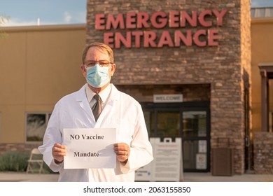 ER Physician Holds Sign No Vaccine Mandate In Front Of Hospital Entrance. 