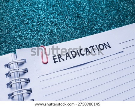 Eradication writting on table background. 