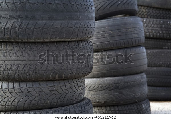 Erased automobile tires background. Structure of a tread
of rubber.    