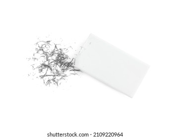 Eraser And Grey Crumbs On White Background, Top View