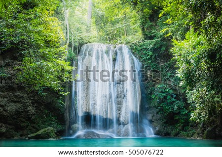 Erawan waterfall, the beautiful waterfall in deep forest at Erawan National Park - A beautiful waterfall on the River Kwai. Kanchanaburi, Thailand