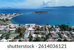 Eretria, Euboea island, Greece - April 10th, 2025 - footage of town Eretria, island Pezonisi, coastline, mountains, ancient archaeological sites, streets and ferries. 