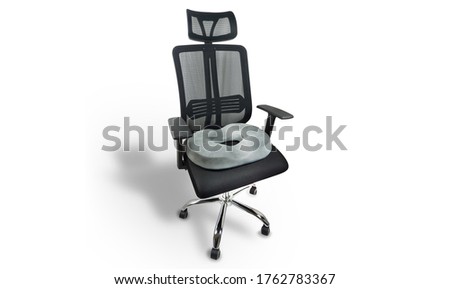 Ergonomic office chair with arm and head rest and doughnut seat support isolated on white background