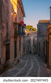 Erice, Italy. 15 August 2021. Typical narrow stone street in the medieval historical center of Erice, Sicily.