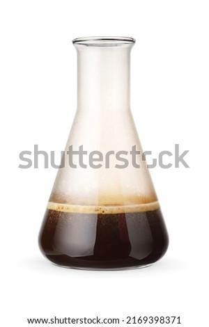 Erlenmeyer chemical flask with coffee isolated on white background. Research or test concept.