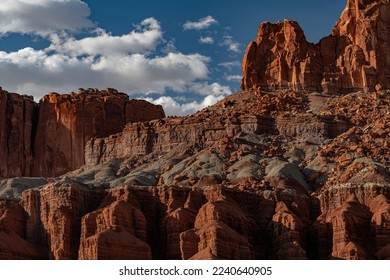 Eroded clifs and clouds at Capitol Reef National Park, Wayne County, Utah
