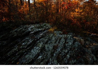 Eroded Rock Formation With Golden Autumn Foliage In The Mason Dixon Trail