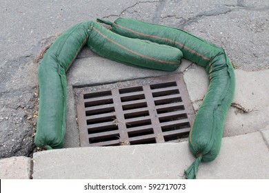 Erosion Control Sandbags Surrounded A Storm Drain