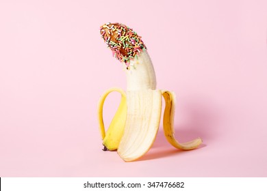 Erotic Fruit , Banana covered with chocolate and colourful sprinkles