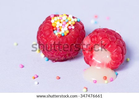 Erotic Fruit Raspberry With Sweetened Condensed Milk And Colourful Sprinkles Erotic Fruit Raspberry With Sweetened Condensed Milk And Colourful Sprinkles