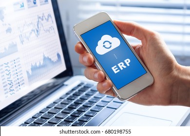 ERP (Enterprise Resource Planning) app on smartphone screen connecting data with cloud computing, access to HR management, production control, accounting