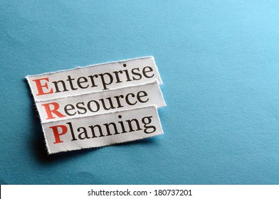 Erp - Enterprise Resource Planning On Blue Paper