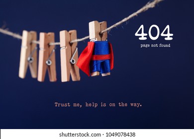 Error 404 Page Not Found Web Page. Toy Clothespin Peg Superhero On Clothesline, Blue Background. Trust Me Help Is On The Way Text Message.